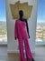 Pink one sleeve jumpsuit. Medium