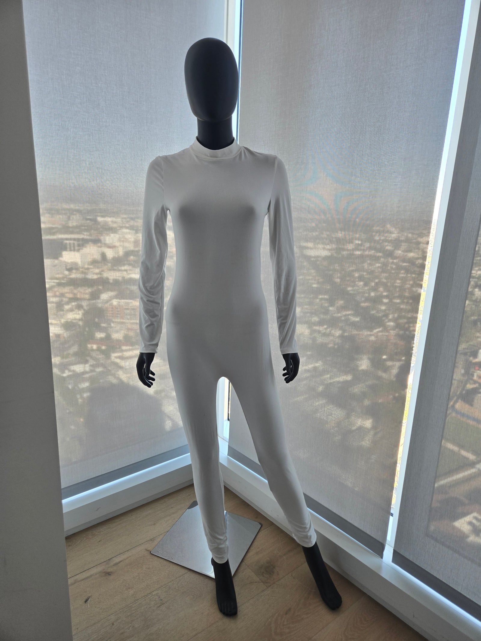 WHITE JUMPSUIT MEDIUM